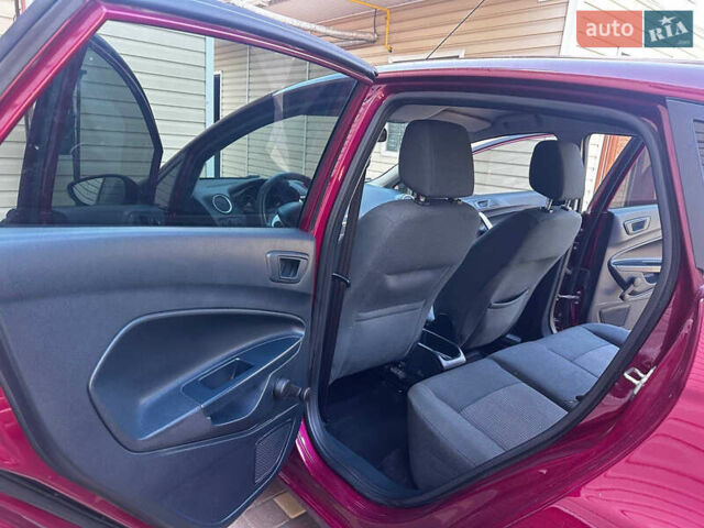 Форд Фиеста 2011 в Кременчуге на Automoto.ua Красный Форд Фиеста, объемом двигателя 1.4 л и пробегом 114 тыс. км за 7800 $, фото 13 на Automoto.ua