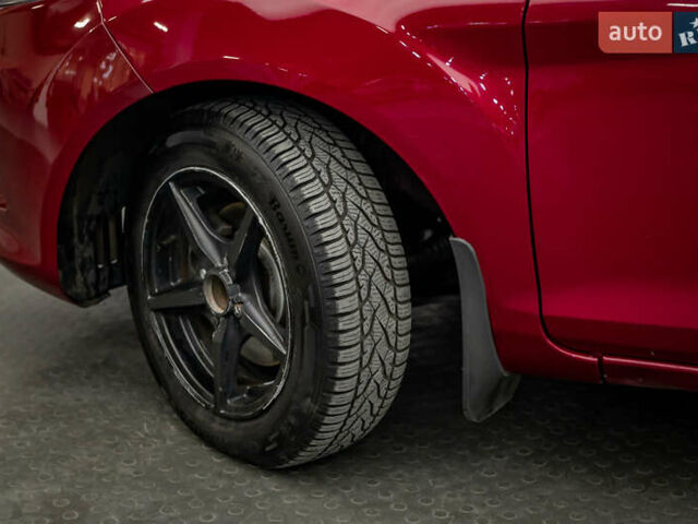 Красный Форд Фиеста, объемом двигателя 1.2 л и пробегом 186 тыс. км за 5664 $, фото 7 на Automoto.ua