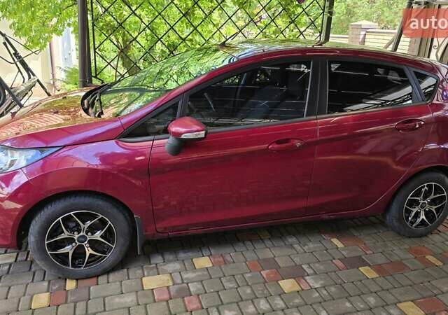 Красный Форд Фиеста, объемом двигателя 1.25 л и пробегом 140 тыс. км за 5800 $, фото 6 на Automoto.ua