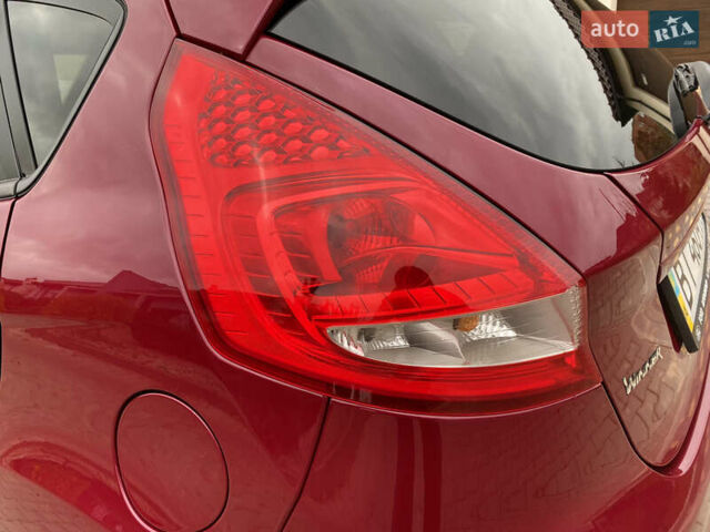 Красный Форд Фиеста, объемом двигателя 1.4 л и пробегом 65 тыс. км за 8300 $, фото 24 на Automoto.ua
