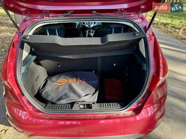 Форд Фиеста 2011 в Киеве на Automoto.ua Красный Форд Фиеста, объемом двигателя 1.4 л и пробегом 157 тыс. км за 6600 $, фото 29 на Automoto.ua