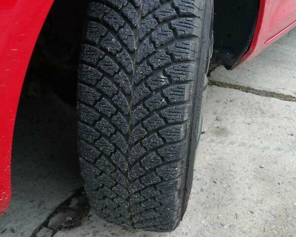 Красный Форд Фиеста, объемом двигателя 1.25 л и пробегом 227 тыс. км за 4750 $, фото 7 на Automoto.ua