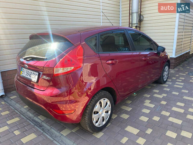 Форд Фиеста 2011 в Кременчуге на Automoto.ua Красный Форд Фиеста, объемом двигателя 1.4 л и пробегом 114 тыс. км за 7800 $, фото 5 на Automoto.ua