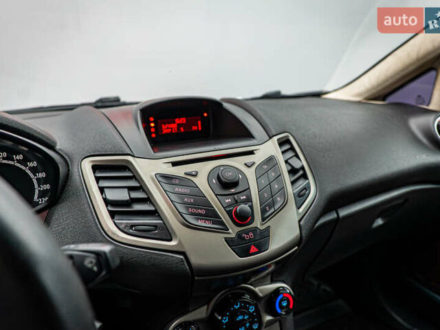 Красный Форд Фиеста, объемом двигателя 1.2 л и пробегом 186 тыс. км за 5664 $, фото 13 на Automoto.ua