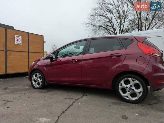 Червоний Форд Фієста, об'ємом двигуна 1.4 л та пробігом 134 тис. км за 5750 $, фото 1 на Automoto.ua