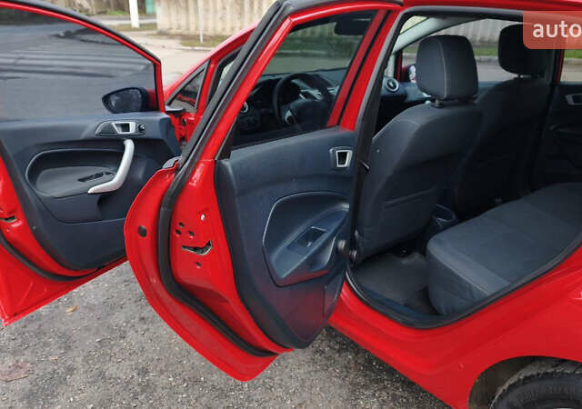 Красный Форд Фиеста, объемом двигателя 1.4 л и пробегом 193 тыс. км за 7500 $, фото 19 на Automoto.ua