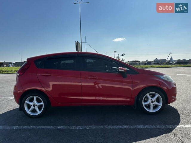 Красный Форд Фиеста, объемом двигателя 1.4 л и пробегом 200 тыс. км за 5900 $, фото 10 на Automoto.ua