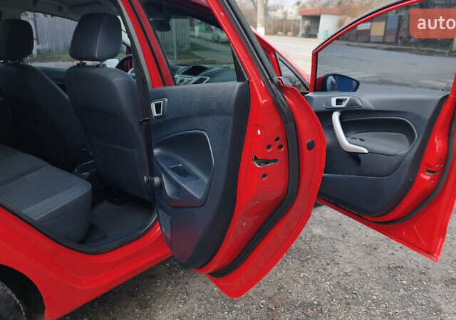 Красный Форд Фиеста, объемом двигателя 1.4 л и пробегом 193 тыс. км за 7500 $, фото 24 на Automoto.ua