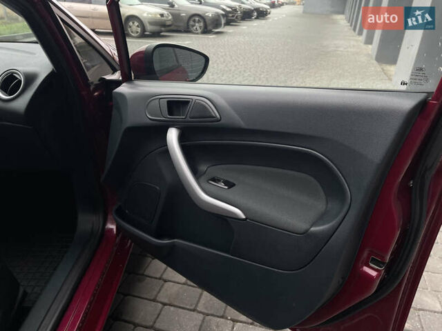 Червоний Форд Фієста, об'ємом двигуна 1.4 л та пробігом 119 тис. км за 7650 $, фото 28 на Automoto.ua
