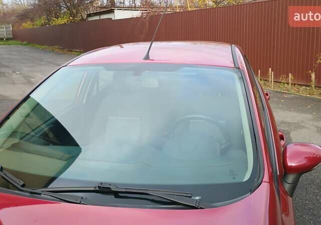 Красный Форд Фиеста, объемом двигателя 1.39 л и пробегом 118 тыс. км за 7000 $, фото 1 на Automoto.ua