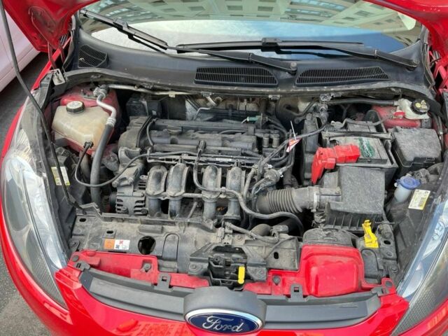 Красный Форд Фиеста, объемом двигателя 1.2 л и пробегом 129 тыс. км за 5500 $, фото 9 на Automoto.ua