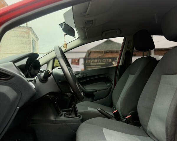 Форд Фиеста 2012 в Лубнах на Automoto.ua Красный Форд Фиеста, объемом двигателя 1.25 л и пробегом 211 тыс. км за 4399 $, фото 11 на Automoto.ua
