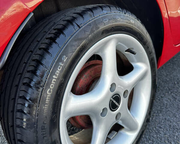 Красный Форд Фиеста, объемом двигателя 1.4 л и пробегом 200 тыс. км за 5900 $, фото 25 на Automoto.ua