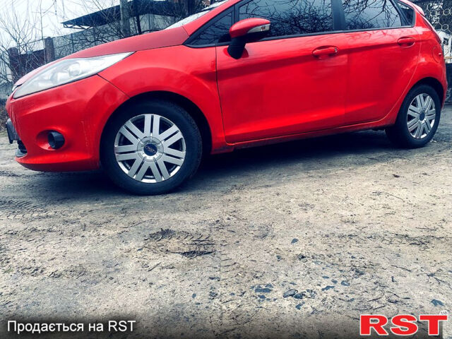 Красный Форд Фиеста, объемом двигателя 1.2 л и пробегом 202 тыс. км за 4100 $, фото 1 на Automoto.ua