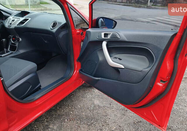 Красный Форд Фиеста, объемом двигателя 1.4 л и пробегом 193 тыс. км за 7500 $, фото 30 на Automoto.ua