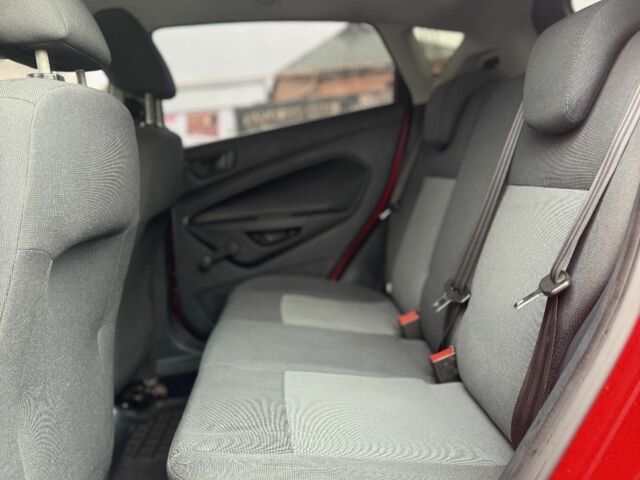 Форд Фиеста 2012 в Лубнах на Automoto.ua Красный Форд Фиеста, объемом двигателя 1.2 л и пробегом 211 тыс. км за 4399 $, фото 14 на Automoto.ua