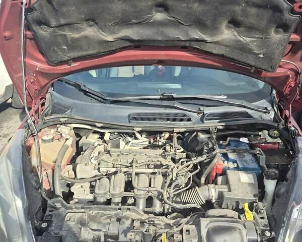 Форд Фієста 2013 у Харкові на Automoto.ua Червоний Форд Фієста, об'ємом двигуна 1.6 л та пробігом 178 тис. км за 5400 $, фото 9 на Automoto.ua