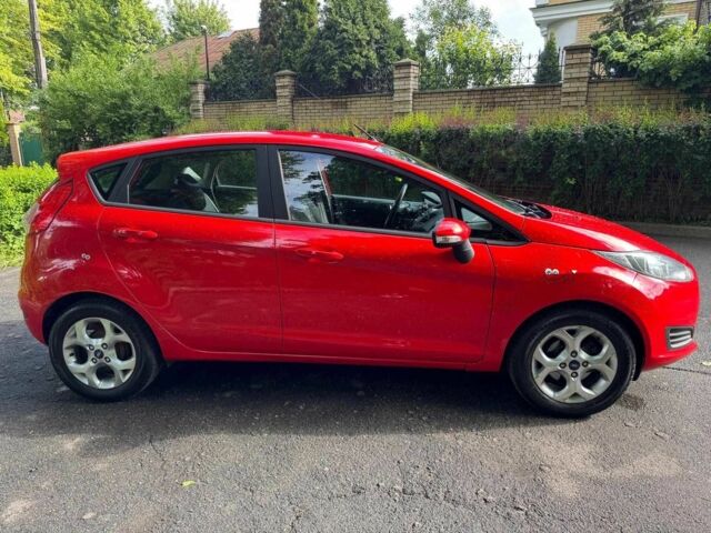 Красный Форд Фиеста, объемом двигателя 1 л и пробегом 130 тыс. км за 5740 $, фото 6 на Automoto.ua