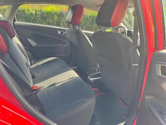 Красный Форд Фиеста, объемом двигателя 1 л и пробегом 130 тыс. км за 5740 $, фото 9 на Automoto.ua