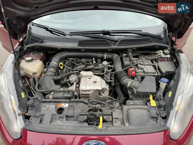 Червоний Форд Фієста, об'ємом двигуна 1 л та пробігом 160 тис. км за 5500 $, фото 13 на Automoto.ua