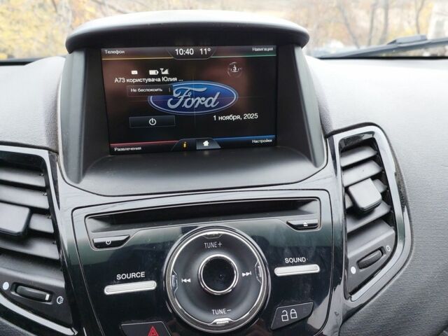 Красный Форд Фиеста, объемом двигателя 1.6 л и пробегом 104 тыс. км за 4000 $, фото 5 на Automoto.ua