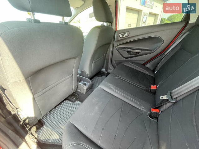 Красный Форд Фиеста, объемом двигателя 1 л и пробегом 63 тыс. км за 8500 $, фото 13 на Automoto.ua