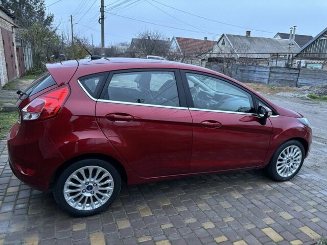 Червоний Форд Фієста, об'ємом двигуна 1.6 л та пробігом 104 тис. км за 7500 $, фото 4 на Automoto.ua