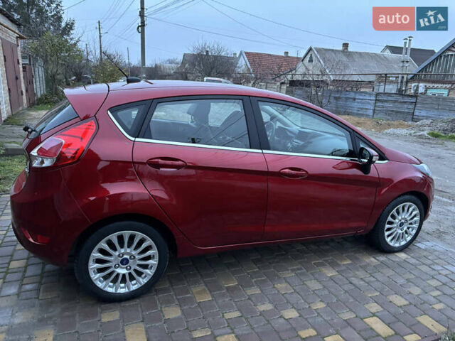 Червоний Форд Фієста, об'ємом двигуна 1.6 л та пробігом 104 тис. км за 7500 $, фото 6 на Automoto.ua