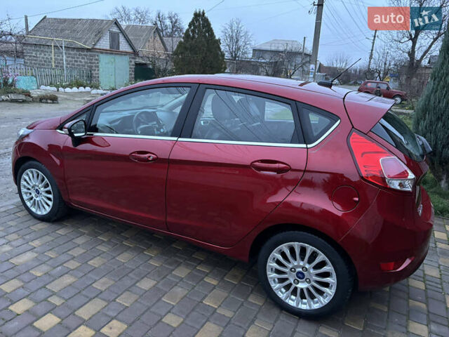 Червоний Форд Фієста, об'ємом двигуна 1.6 л та пробігом 104 тис. км за 7500 $, фото 4 на Automoto.ua
