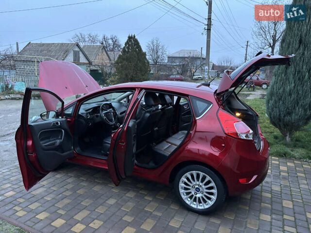 Червоний Форд Фієста, об'ємом двигуна 1.6 л та пробігом 104 тис. км за 7500 $, фото 13 на Automoto.ua