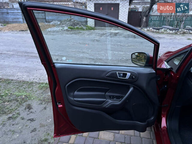 Червоний Форд Фієста, об'ємом двигуна 1.6 л та пробігом 104 тис. км за 7500 $, фото 20 на Automoto.ua