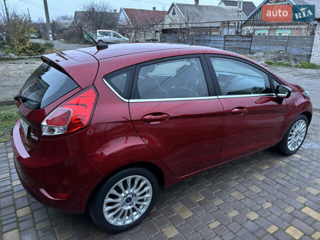 Червоний Форд Фієста, об'ємом двигуна 1.6 л та пробігом 104 тис. км за 7500 $, фото 5 на Automoto.ua