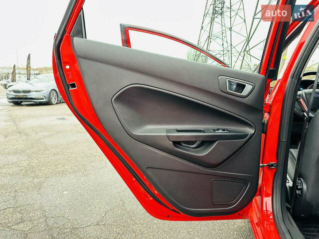 Красный Форд Фиеста, объемом двигателя 1 л и пробегом 56 тыс. км за 8800 $, фото 16 на Automoto.ua