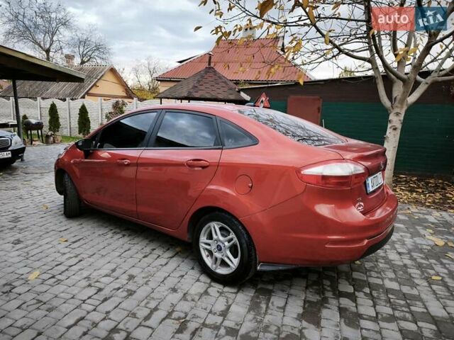 Красный Форд Фиеста, объемом двигателя 1.6 л и пробегом 113 тыс. км за 6900 $, фото 2 на Automoto.ua