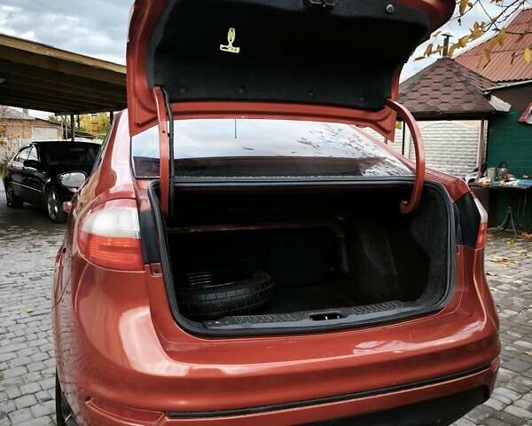 Красный Форд Фиеста, объемом двигателя 1.6 л и пробегом 113 тыс. км за 6900 $, фото 13 на Automoto.ua