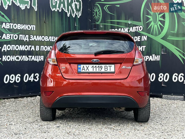 Красный Форд Фиеста, объемом двигателя 1.6 л и пробегом 105 тыс. км за 9400 $, фото 6 на Automoto.ua