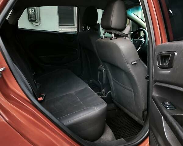 Красный Форд Фиеста, объемом двигателя 1.6 л и пробегом 113 тыс. км за 6900 $, фото 16 на Automoto.ua