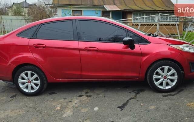 Червоний Форд Фієста, об'ємом двигуна 1.6 л та пробігом 166 тис. км за 7200 $, фото 2 на Automoto.ua