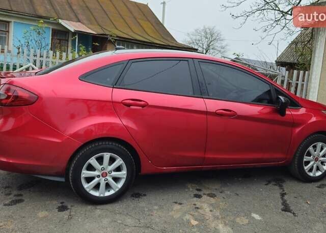 Червоний Форд Фієста, об'ємом двигуна 1.6 л та пробігом 166 тис. км за 7200 $, фото 3 на Automoto.ua