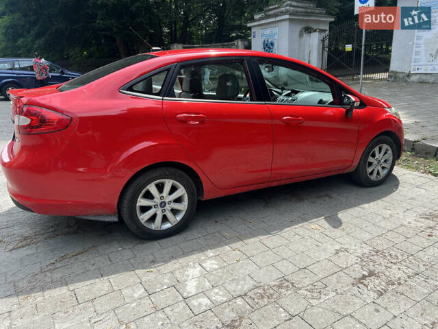 Красный Форд Фиеста, объемом двигателя 1.6 л и пробегом 227 тыс. км за 6700 $, фото 3 на Automoto.ua