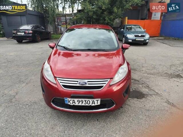 Красный Форд Фиеста, объемом двигателя 1.6 л и пробегом 250 тыс. км за 6200 $, фото 1 на Automoto.ua