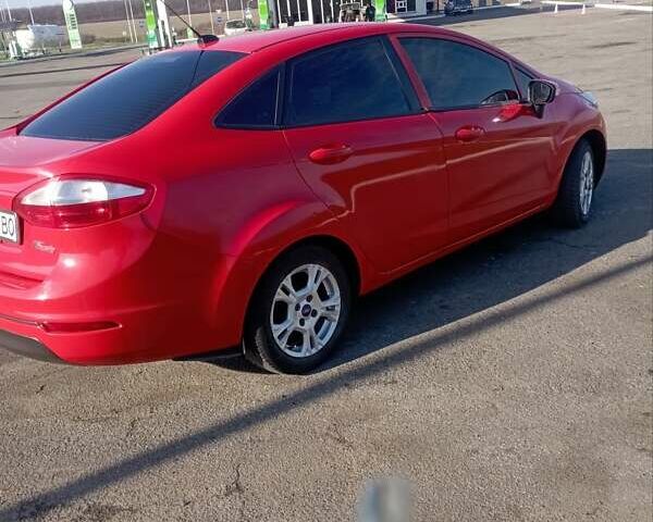 Красный Форд Фиеста, объемом двигателя 1.6 л и пробегом 181 тыс. км за 4999 $, фото 2 на Automoto.ua