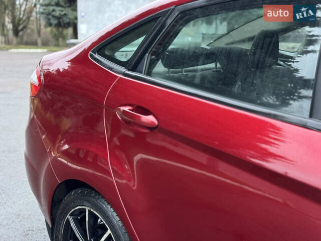Красный Форд Фиеста, объемом двигателя 1.6 л и пробегом 150 тыс. км за 6599 $, фото 17 на Automoto.ua