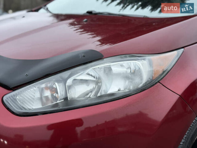 Красный Форд Фиеста, объемом двигателя 1.6 л и пробегом 150 тыс. км за 6599 $, фото 5 на Automoto.ua