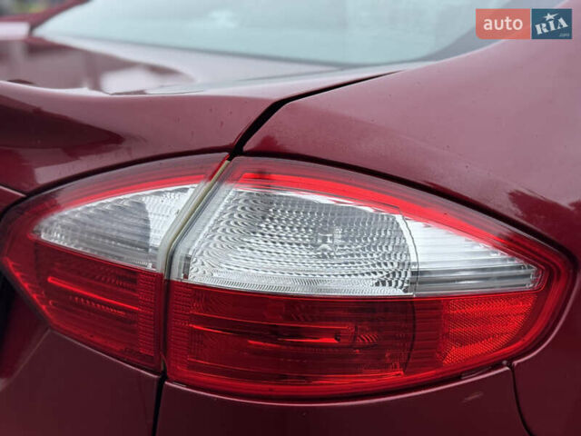 Красный Форд Фиеста, объемом двигателя 1.6 л и пробегом 150 тыс. км за 6599 $, фото 21 на Automoto.ua