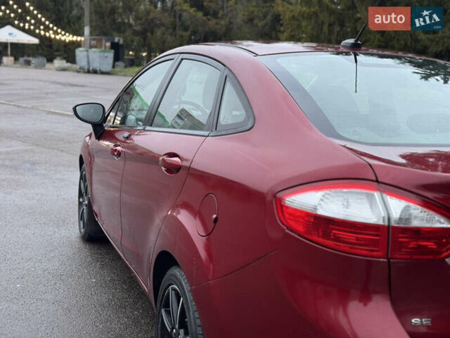 Красный Форд Фиеста, объемом двигателя 1.6 л и пробегом 150 тыс. км за 6599 $, фото 28 на Automoto.ua