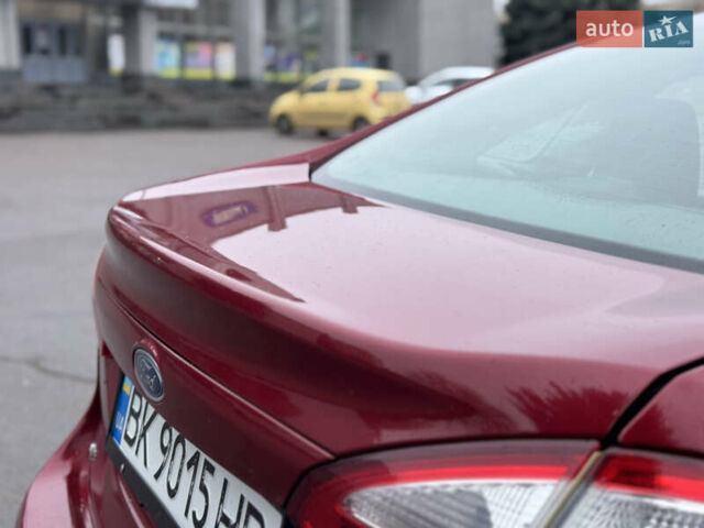 Красный Форд Фиеста, объемом двигателя 1.6 л и пробегом 150 тыс. км за 6599 $, фото 22 на Automoto.ua