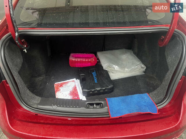 Червоний Форд Фієста, об'ємом двигуна 1.6 л та пробігом 243 тис. км за 7500 $, фото 9 на Automoto.ua