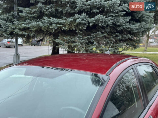 Красный Форд Фиеста, объемом двигателя 1.6 л и пробегом 150 тыс. км за 6599 $, фото 6 на Automoto.ua