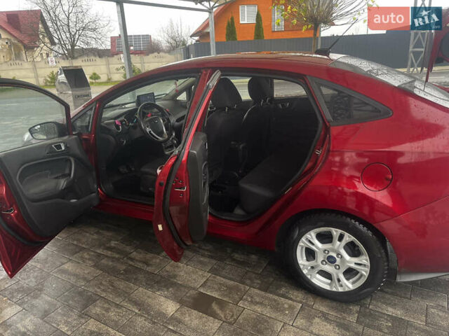 Червоний Форд Фієста, об'ємом двигуна 1.6 л та пробігом 243 тис. км за 7500 $, фото 4 на Automoto.ua